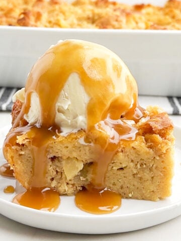 pineapple pudding topped with vanilla ice cream and caramel whiskey sauce.