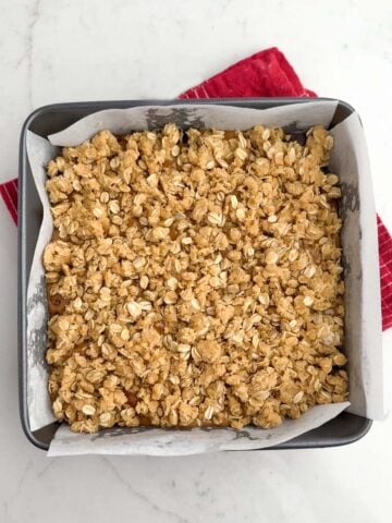 unbaked caramelitas in a square baking pan.