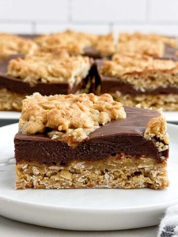 a chocolate revel bar on a white plate.
