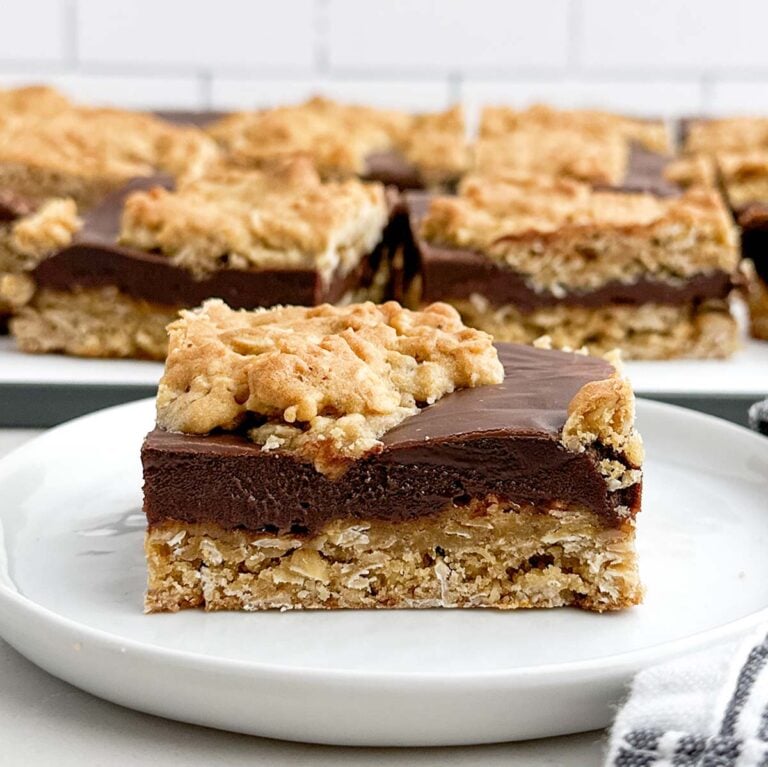 a chocolate revel bar on a white plate.