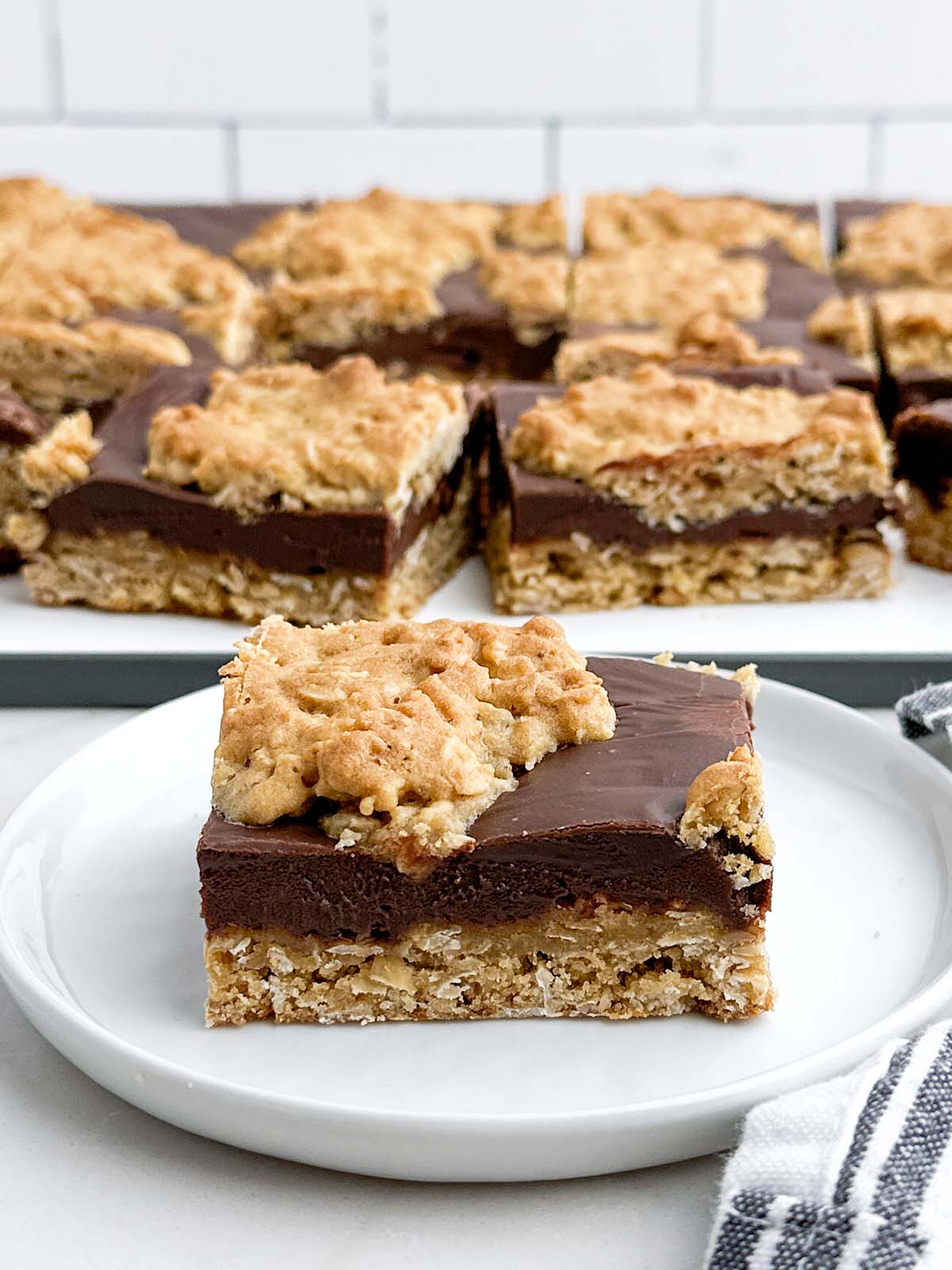 a chocolate revel bar on a white plate.