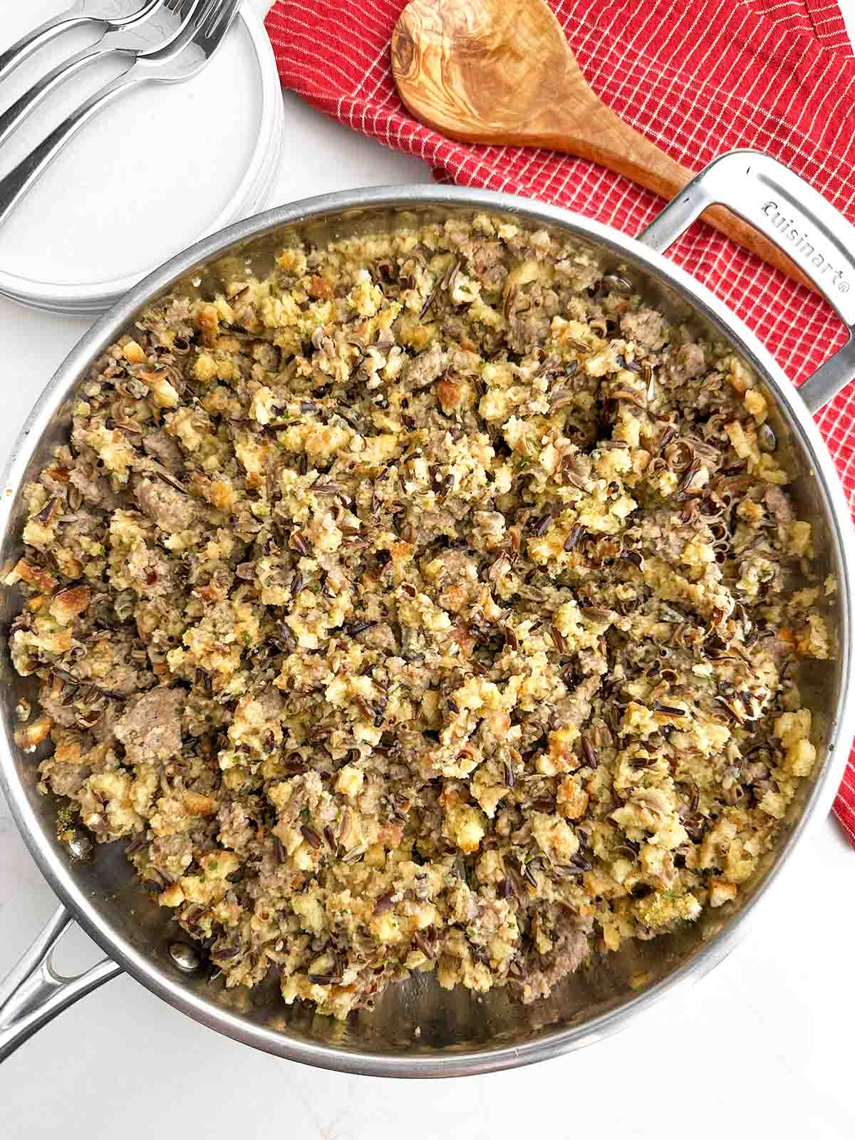 wild rice stuffing in a stainless steel skillet.