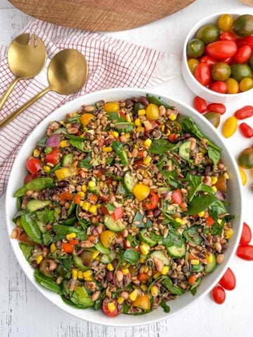 corn and wild rice salad in a white bowl.