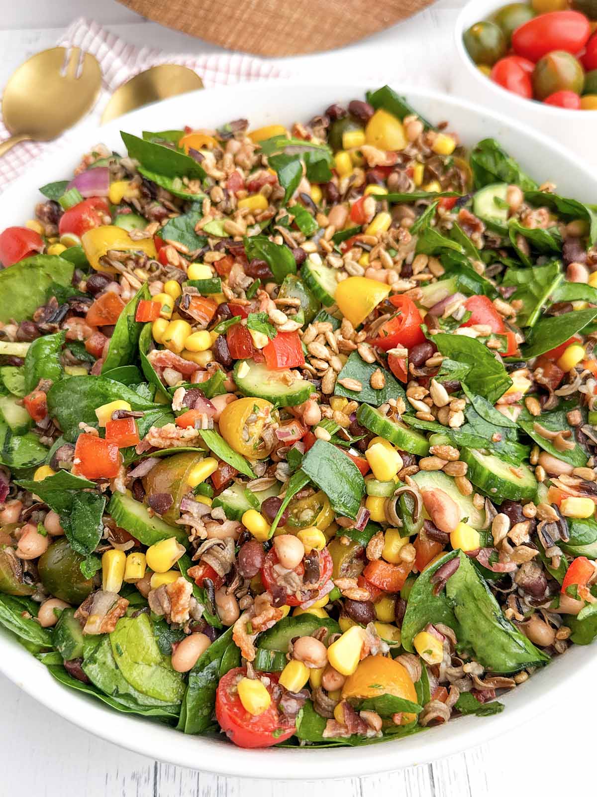 corn and wild rice salad in a white bowl.